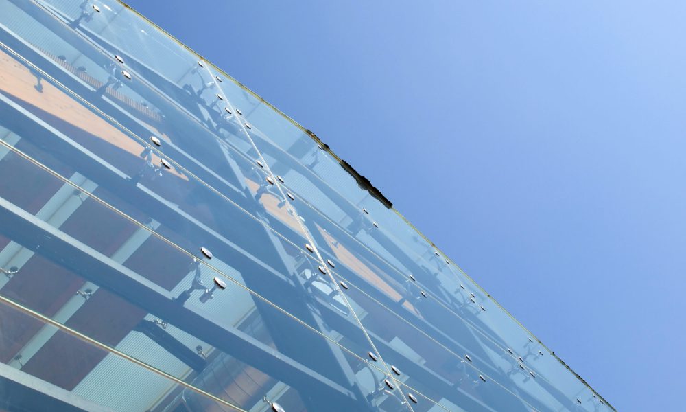 Detail of a modern structural glass facade with copy space