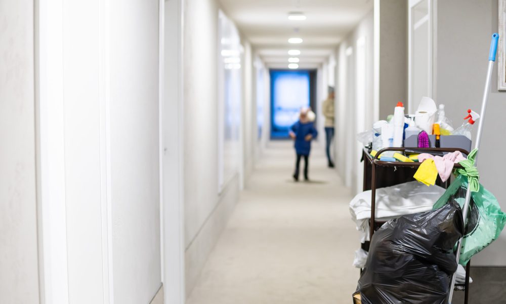 Cleaners trolley with cleaning equipments at hotel