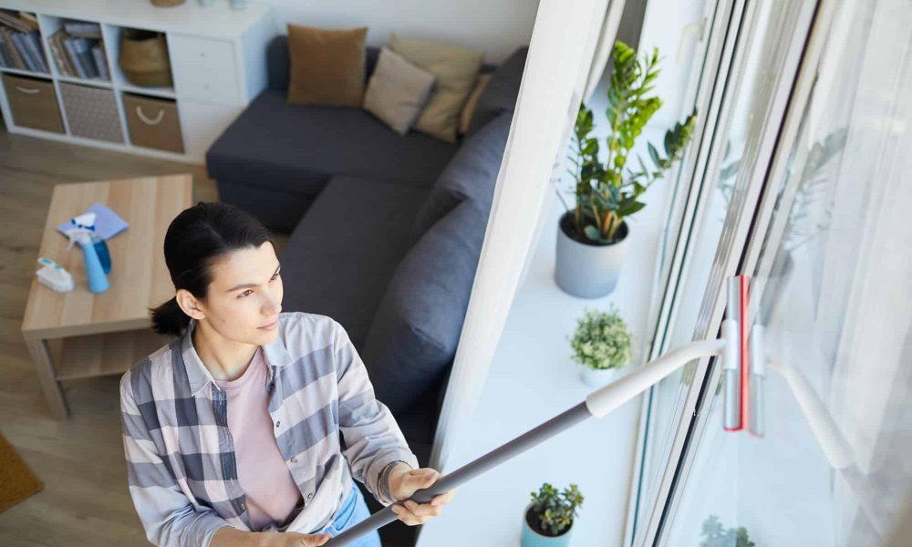 woman-cleaning-the-window-at-home.jpg